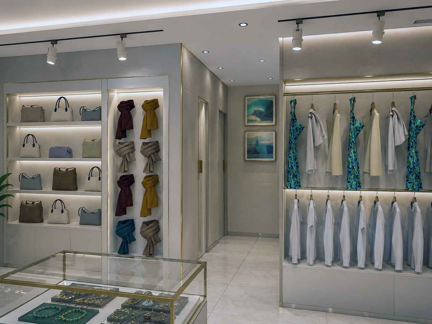 Boutique display area with handbags, scarves and hanging apparel section