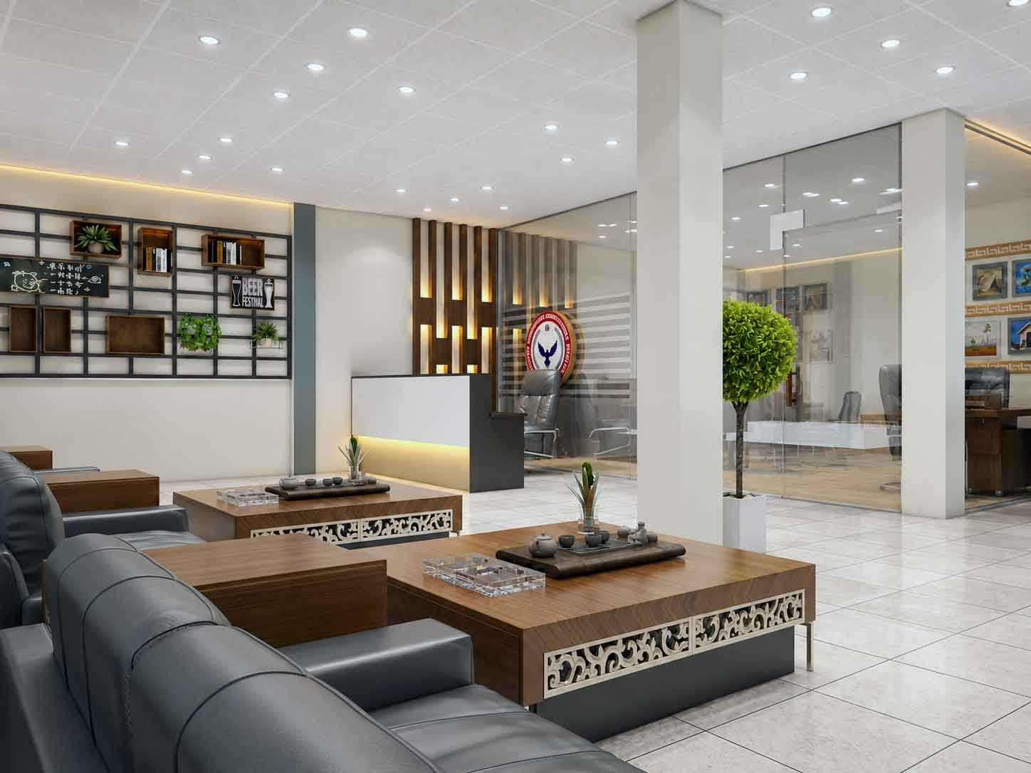 Office lounge area with sofa seating, wooden tables, and view into reception and cabins