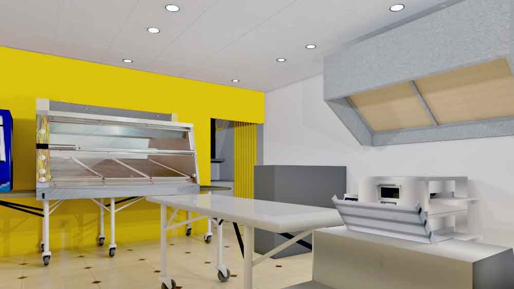 Yellow accent wall kitchen area with food display case and exhaust system