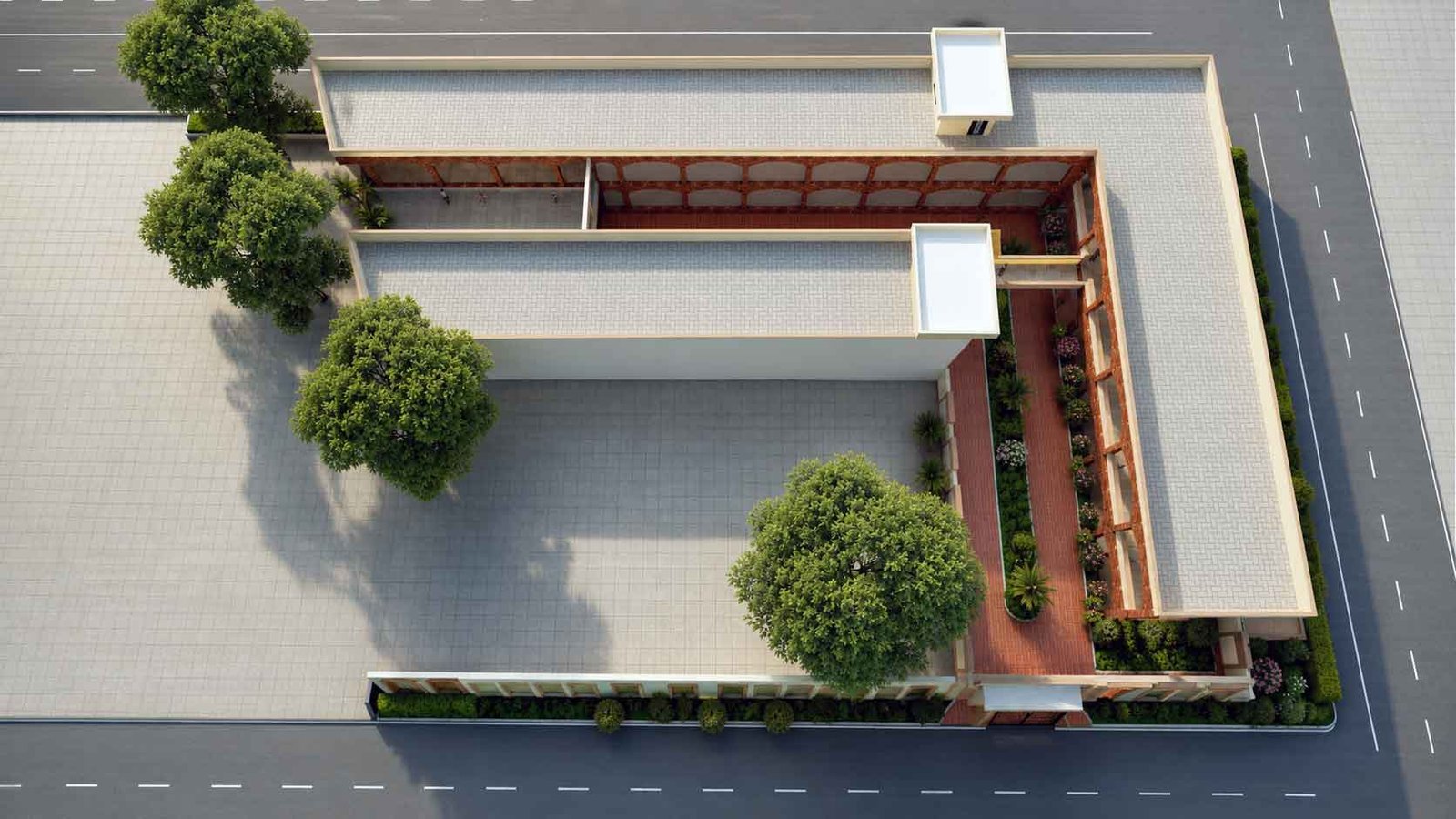 Aerial view of school building layout showing pergola walkway and landscaped entrance