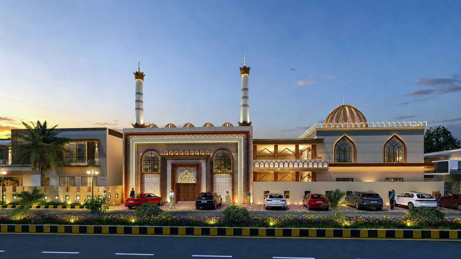 Front elevation of community mosque with twin minarets at dusk