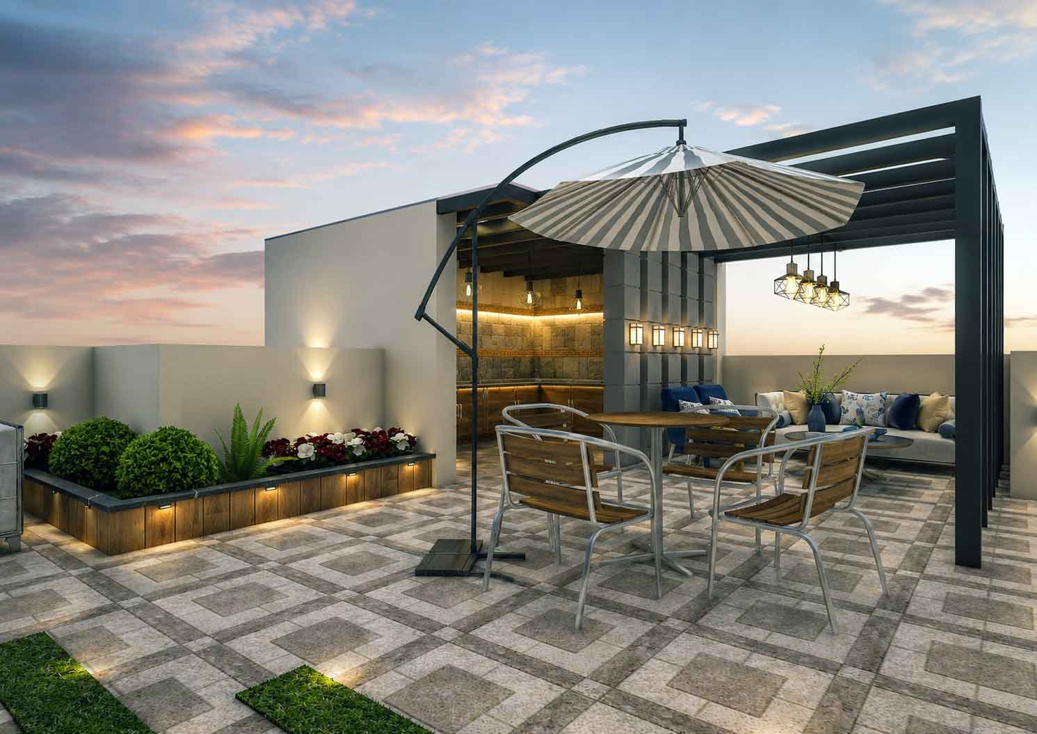 Rooftop terrace design with pergola, dining set, striped umbrella, and outdoor kitchen at sunset